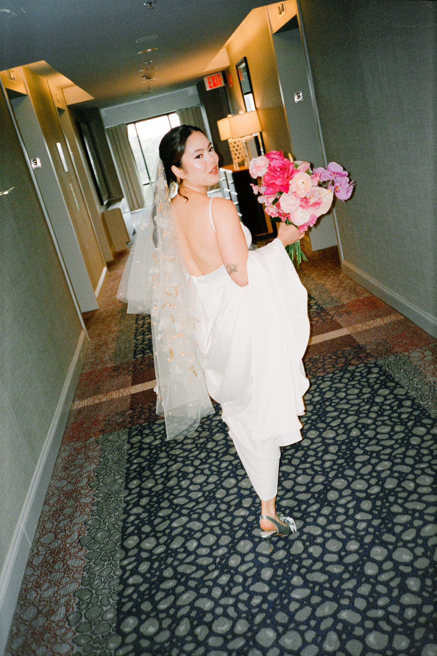 Bridal portraits with colorful florals in Boston on film photography